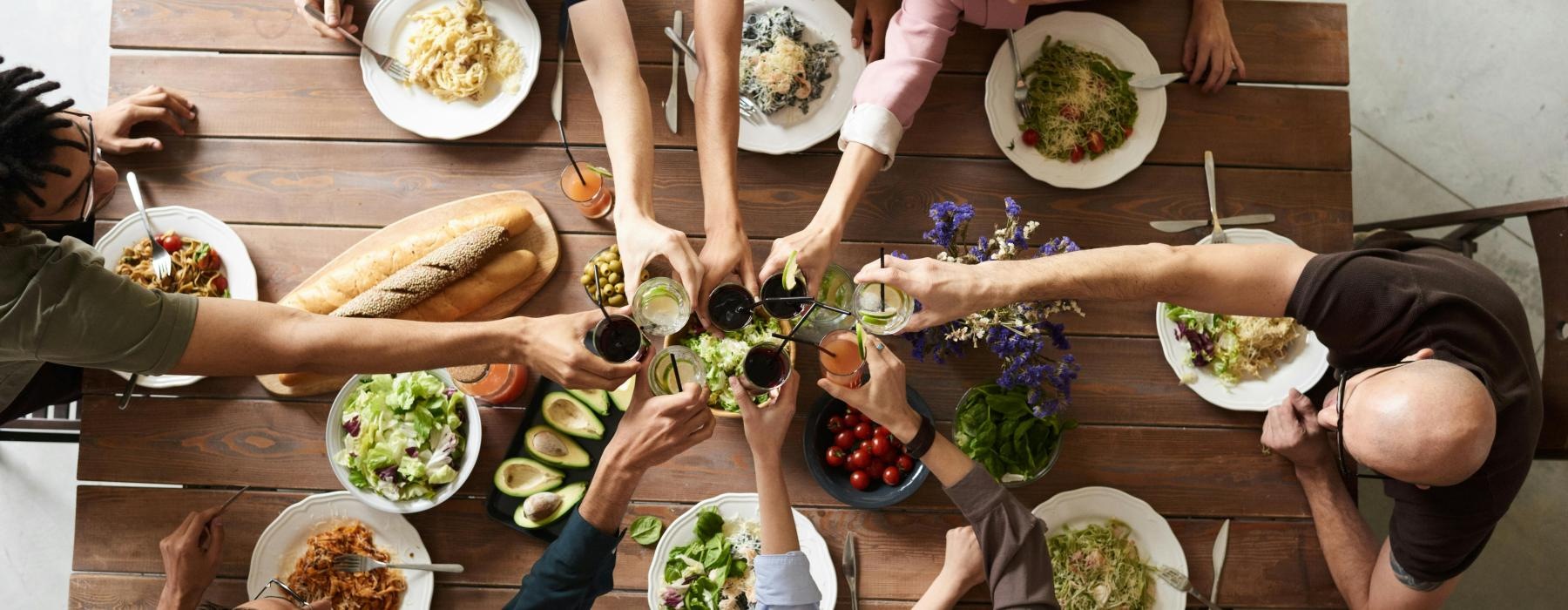 a group of people eating at a table