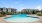 a swimming pool in front of a house