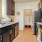 a kitchen with black appliances